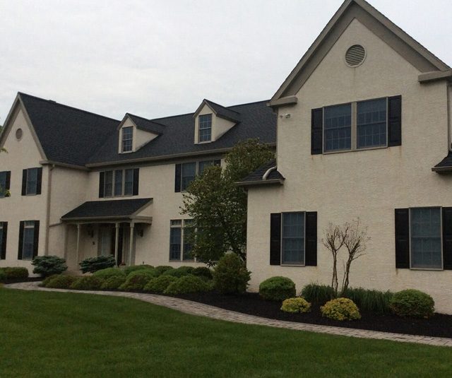 residential gutter replacement done for modern suburban home